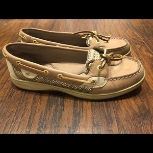 Gold Sperry Topsider sneakers